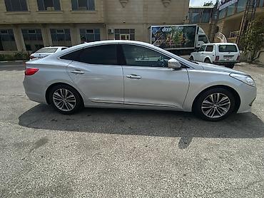 Hyundai: Hyundai Grandeur: 2.2 l | 2014 il Sedan — 2