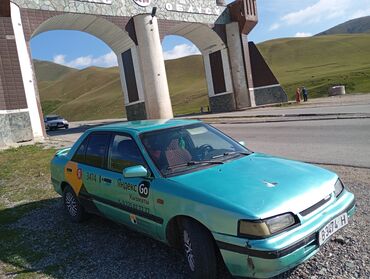 автомобиль талас: Mazda 323: 1993 г., 1.6 л, Механика, Бензин, Седан