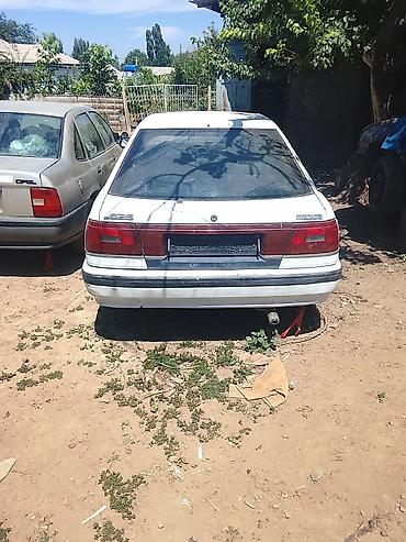 снятие с учета: Mazda 626: 1991 г., 2.2 л, Механика, Бензин, Хэтчбэк — 1
