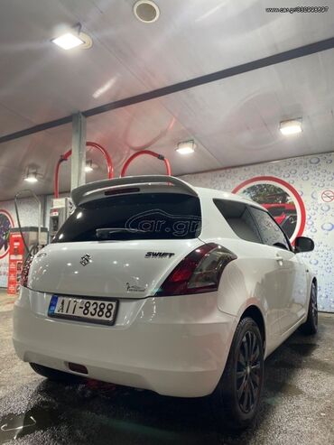 Transport: Suzuki Swift : 1.2 l | 2011 year | 175600 km. Coupe/Sports