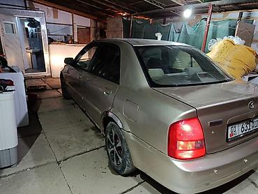 protege: Mazda 323: 1999 г., 1.5 л, Автомат, Бензин, Седан — 4