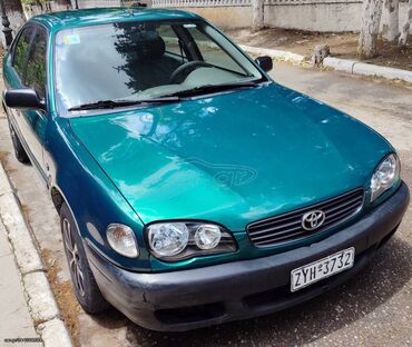 Transport: Toyota Corolla: 1.4 l | 2001 year Hatchback