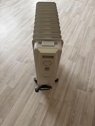 peçin radiatoru: Yağlı radiator/qızdırıcı – Auksis (elektrikli) Xüsusiyyətlər: - Yağla — 1