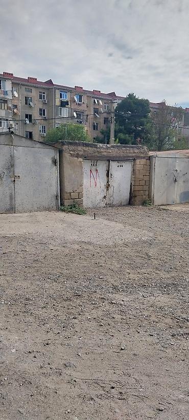 icarə boks: Sumqayıt ş. 3-cü mkr/n Tam Store mağazasının arxasında sənədi olan daş — 1