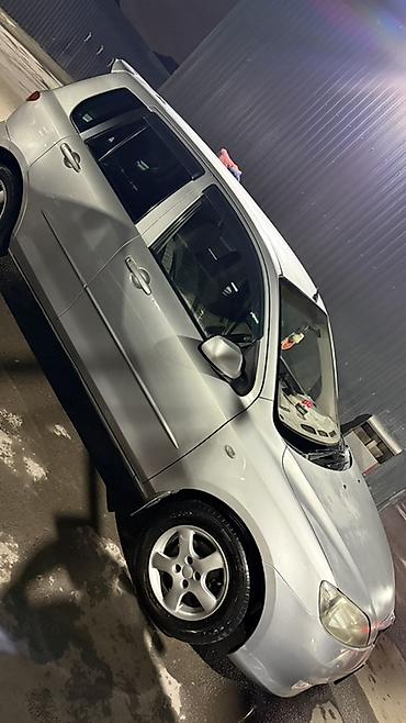 bmw ix3: Mazda Demio: 2003 г., 1.3 л, Автомат, Бензин, Хэтчбэк — 9