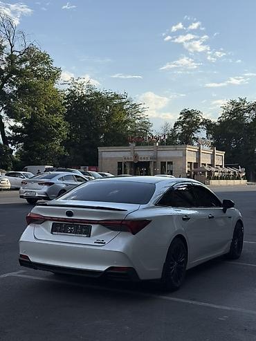 corolla 2016: Toyota Avalon: 2021 г., Гибрид, Седан — 4