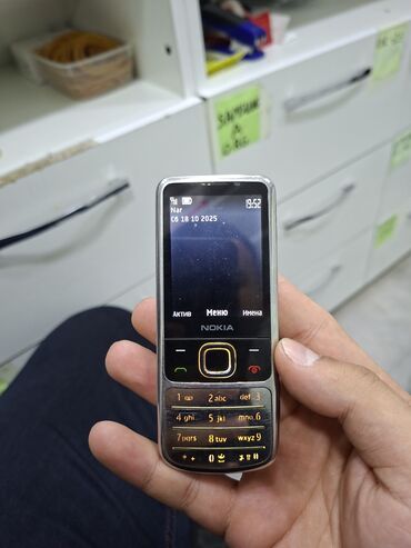 телефон флай фс458: Nokia 6700 Slide, цвет - Серебристый