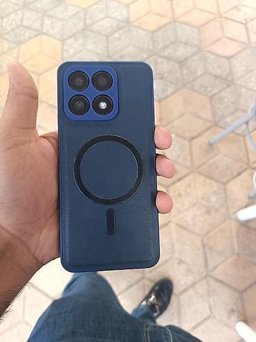 14 pro irsad: Honor 128 GB, rəng - Qara, Barmaq izi, İki sim kartlı, Face ID — 2