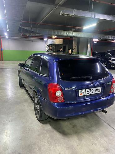 familia: Mazda Familia: 2000 г., Механика, Бензин, Хэтчбэк — 1