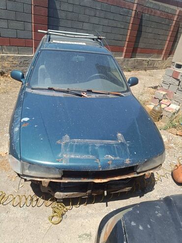 Другие детали кузова: Универсал Mitsubishi Lancer, модель пятого поколения, в темно-зеленом — 4