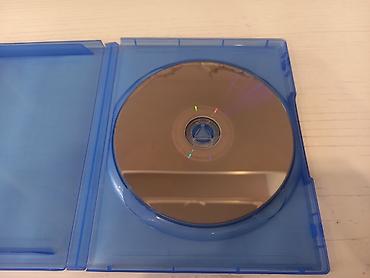 TV və video: PS4 Konsolu Üçün "GTA 5" Oyun Diski Satılır. Diskin xarici tərəfi — 4