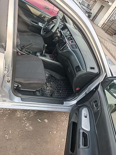 Mitsubishi: Mitsubishi Lancer: 2005 г., 1.3 л, Механика, Бензин, Седан — 12