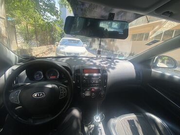 Kia Ceed: 1.6 л | 2009 г. Универсал