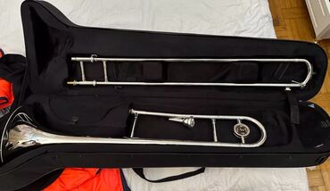 Gitaralar: Trombon,Yeni aletdir,Amerika aletidir