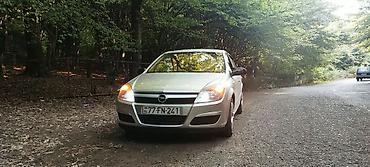 üstü açıq maşın: Opel Astra H, 5 qapılı hetçbek - Gümüşü rəng - Benzin mühərriki - Ön — 2