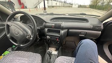 e39 rul: Opel Astra F Caravan (universa) – tünd mavi rəngdə, nömrə 10-RG-592 — 6