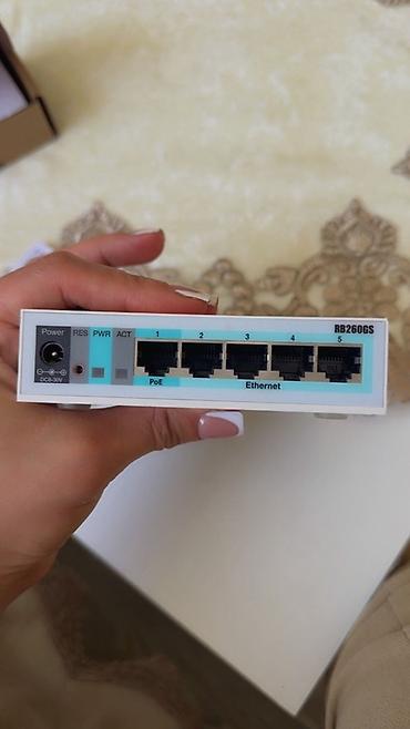 ipad min 5: MikroTik RouterBOARD RB260GS (CSS106-5G-1S) idarə olunan switch - 5 — 1