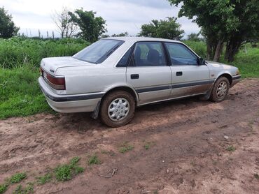 авто аварийное: Mazda 626: 1990 г., 2 л, Механика, Бензин, Седан