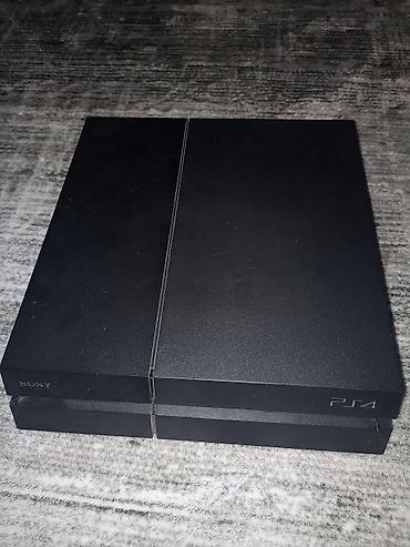 Игровая консоль Sony PlayStation 4 (PS4) с комплектом аксессуаров и