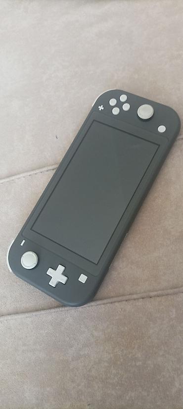 rdr 2 disk: Nintendo Switch Lite Islek veziyyetdedir hec bir problemi yoxdur — 1
