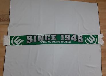 sve za punije: Fudbalski navijački šal od Vlf Wolfsburg kluba iz Nemačke. Šal je — 3