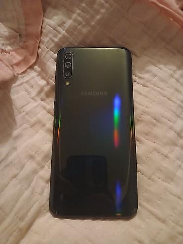 телевизор samsung: Samsung Galaxy A50, 128 ГБ, цвет - Синий, Сенсорный, Отпечаток пальца, Две SIM карты — 6