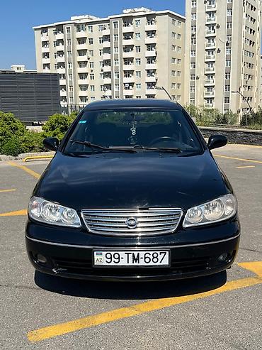 mini cooper kreditle: Nissan Sunny: 1.6 l | 2006 il Sedan — 2