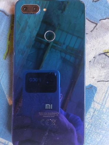 lian li: Xiaomi Mi 8 Lite, rəng - Mavi, 
 Barmaq izi — 3