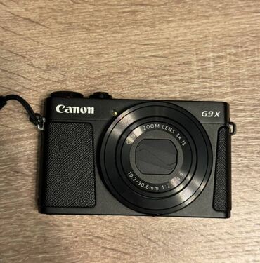 core i3 ноутбук: Canon PowerShot G9 X с черным корпусом, оснащенная объективом с