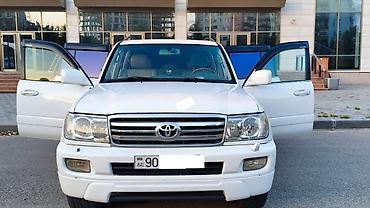 1998 ford transit: Toyota Land Cruiser 100 (J100) – ağ rəng, 5 qapı, tam ölçülü off-road — 1