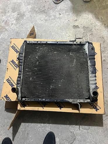 İsuzu npr 66 mstkalı maşının radiatorudur usdençıxmadır tamarginal dı lalafo.az -da İsuzu npr 66 mstkalı maşının radiatorudur usdençıxmadır tamarginal dı
