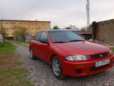 малолитражные автомобили: Mazda 323: 1995 г., 1.5 л, Механика, Бензин, Седан