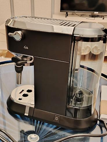 Digər məişət texnikası: Delonghi firmasina aid kofe demleyen aparatdi.Teze mehsuldur — 4