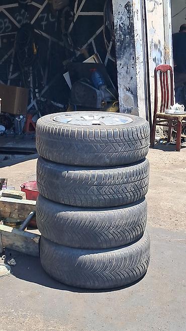 opel kolpak: 4 ədəd avtomobil təkəri və 1 ədəd Opel loqolu təkər qalpağı (kolpak) — 3