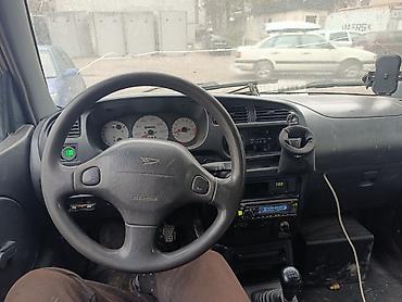 Daihatsu: Daihatsu Cuore: 2001 г., 1 л, Механика, Бензин — 6