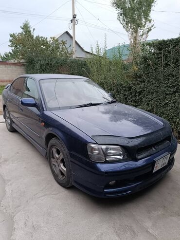 Другой тюнинг: Седан темно-синего цвета с аэродинамическим обвесом и заниженным — 4