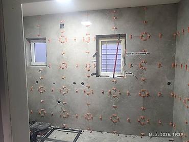 Zidari: Usluge keramičara – profesionalno postavljanje pločica i podova - — 2