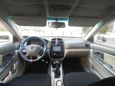 Kia Cerato: 1.6 л | 2006 г. Седан
