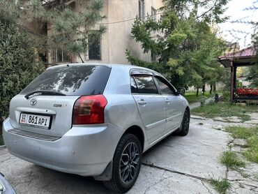 купить машину без первоначального взноса: Хэтчбек Toyota Corolla серебристого цвета, 2003 года 1,8 объем