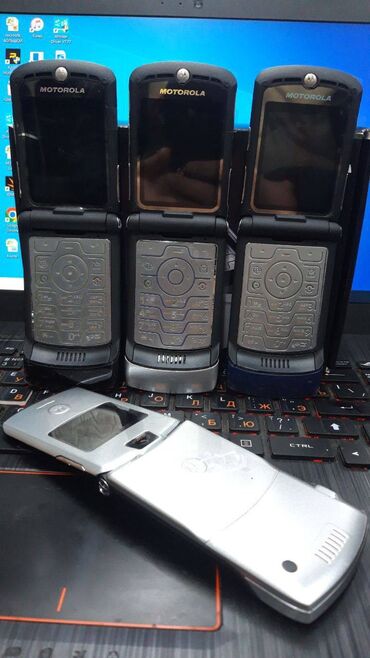 Мобильные телефоны: Motorola Новый