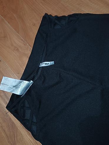 svecane ravne cipele: Crne ženske pantalone sa zvonastim nogavicama. - Veličina: L (oznaka — 1