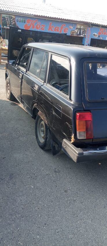 VAZ (LADA): Model: LADA 2104 (universaI) Rəng: qara Kuzov: 5 qapılı, yük bölməsi — 3