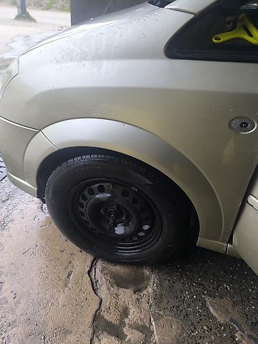 07 satisi: R15 4 bolt demir diskdi ancag barter edirem kraskasi normaldi cox — 1