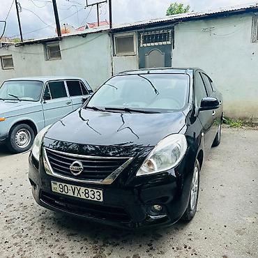 2012 07: Nissan Sunny: 1.5 l | 2012 il Sedan — 1