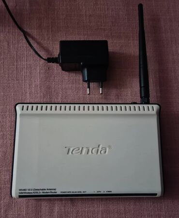 router modem: Modem ( router ). " Tenda " Ishleyen veziyyetdedir. Hech bir noqsan