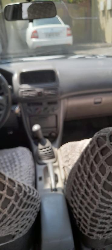 toyota camry oluxana: Toyota Corolla: 1.6 l | 1998 il Sedan — 5