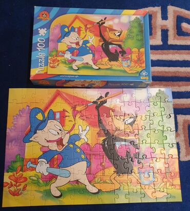 kamper za lutke: ﻿Looney tunes Trefl puzzle- puzle. 100 komada.  Lovac i patak Daca