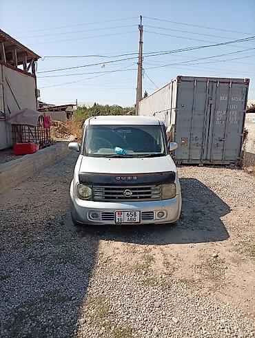 авто в такси: Nissan Cube: 2003 г., 1.3 л, Автомат, Бензин, Минивэн — 3