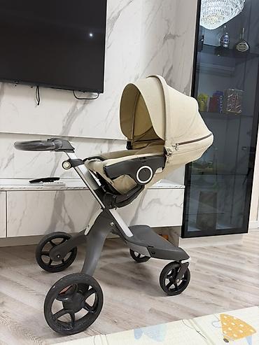 коляски анекс бу: Stokke brendi. 2300 azn alinib yeni kimi qalib. Tutacaqi yuxarida — 1