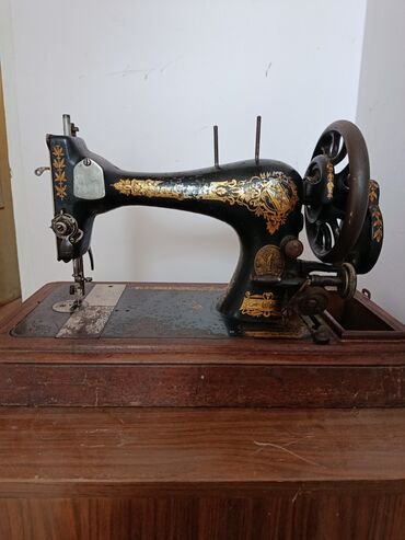modelka maşınlar: Məhsul: Singer tikiş maşını (antique model) Təsvir: - The Singer Mfg